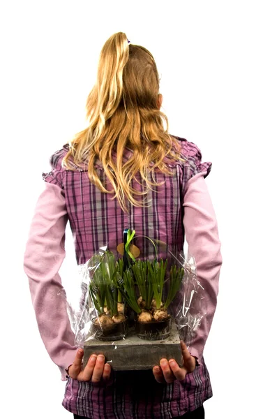 stock image Young blonde girl with flowers