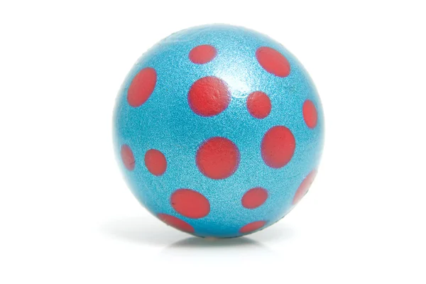 Bola azul con puntos rojos —  Fotos de Stock