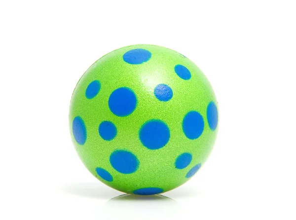 Groene bal met blauwe stippen — Stockfoto