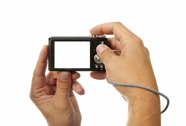 Руки с цифровой фотокамерой — стоковое фото
