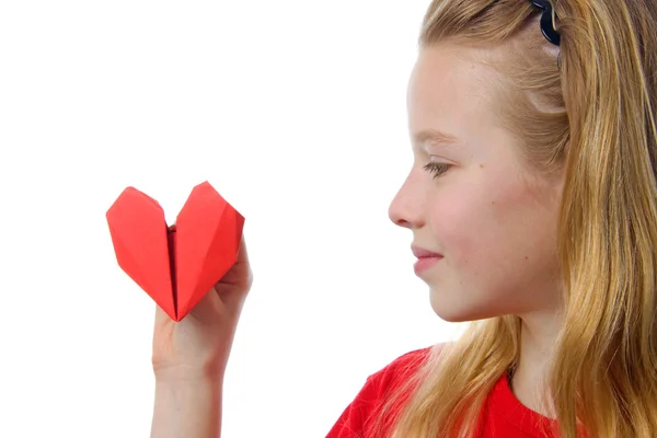 Girl with heart made out of paper — Stock Photo, Image