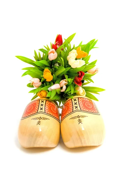 Traditional Dutch yellow wooden shoes — Stock Photo, Image