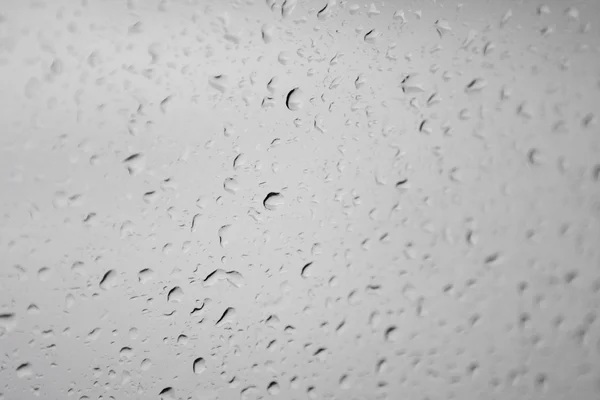 Gotas de água da chuva no fundo da janela Imagens Royalty-Free