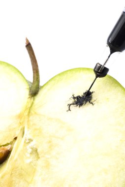 Green apple injected with chemicals clipart