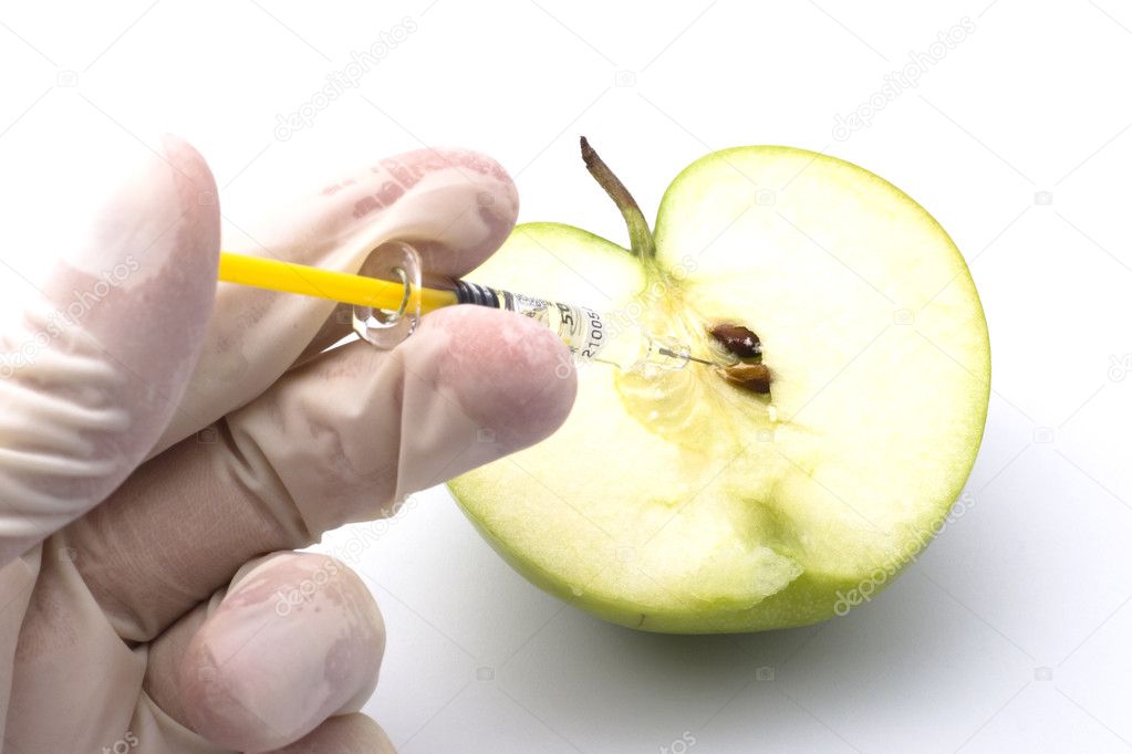 Sliced green apple injected with