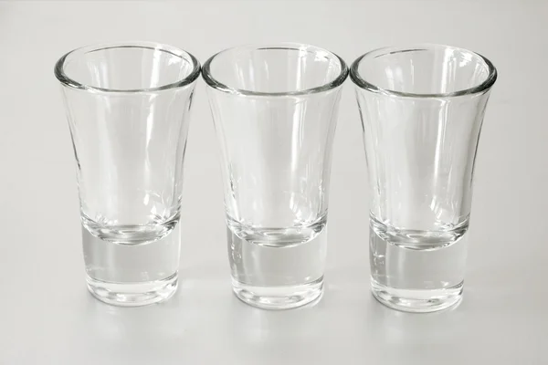 Tre tomma snapsglas — Stockfoto