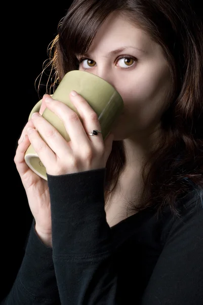 Young woman drinking — Stock Photo, Image