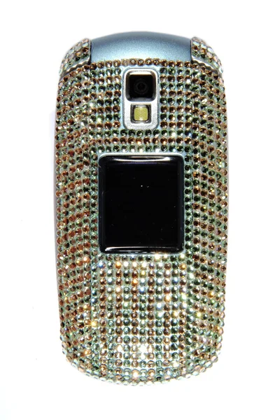 Мобильный телефон, инкрустированный кристаллами — стоковое фото