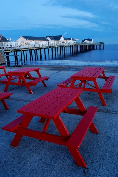 Červená lavička — Stock fotografie