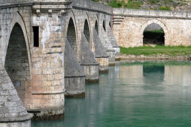 Old stone bridge in Visegrad clipart