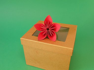Gift box and origami flower clipart