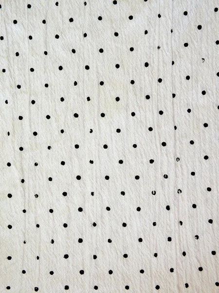 白い斑点を付けられた生地 ロイヤリティフリーのストック画像
