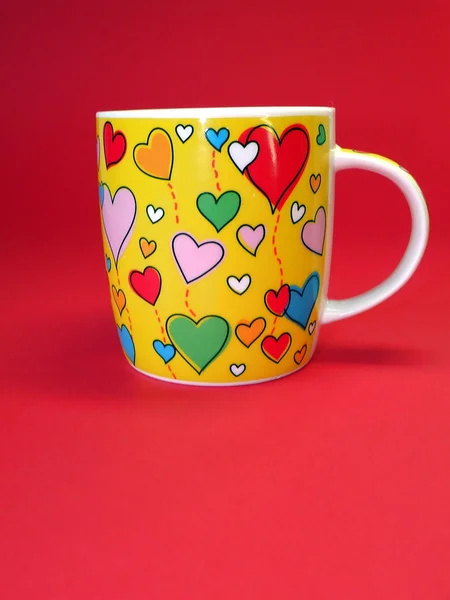Cup with hearts — Stock Photo, Image