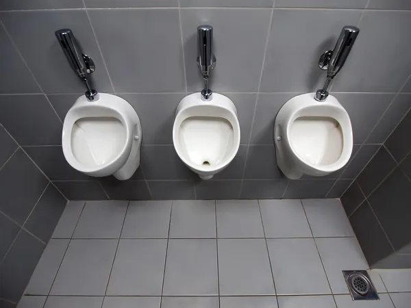 3 urinals in men's room — Stock Photo, Image