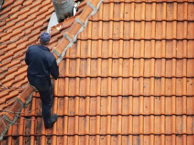 Roofer doing repair clipart