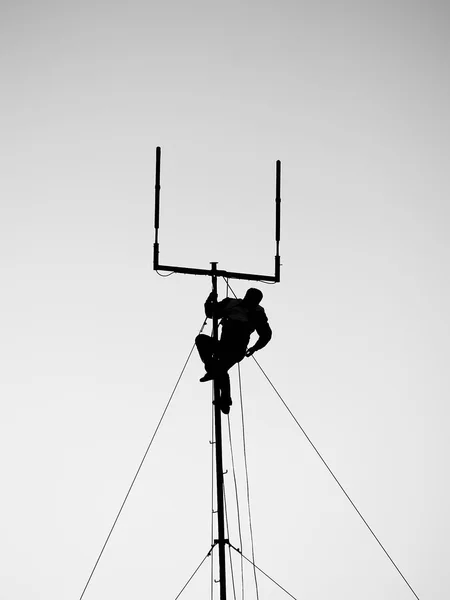 Hanging from antenna — Stock Photo, Image