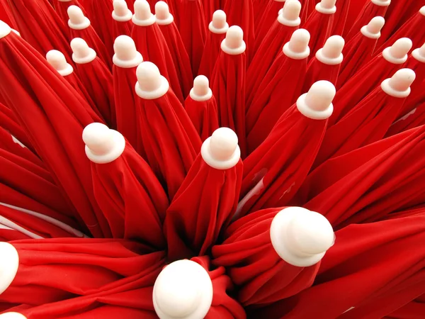 stock image Many red parasol at the beach