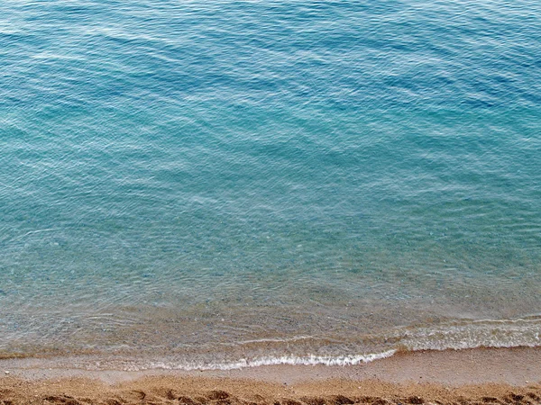 Sea surface at beach — Stock Photo, Image