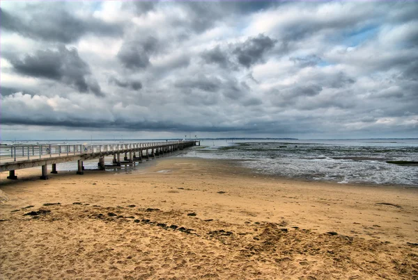 Stormachtige dag op de pier — Stockfoto