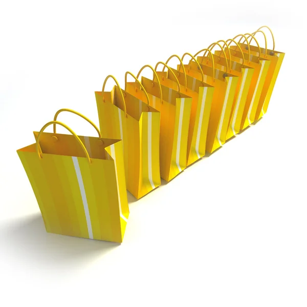 Amarelo sacos de compras trio — Fotografia de Stock
