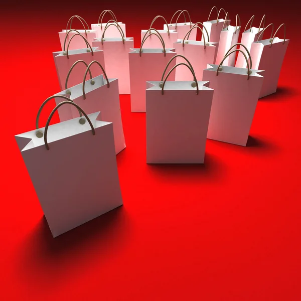 Kırmızı zemin üzerine alışveriş torbaları — Stok fotoğraf