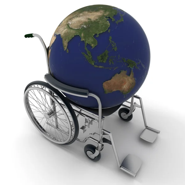 Παγκόσμιο χάρτη σε μια αναπηρική καρέκλα — Φωτογραφία Αρχείου