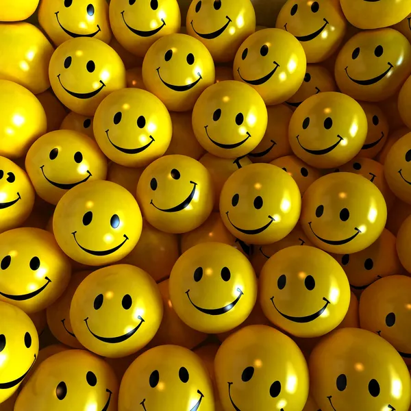 Желтые счастливые смайлики — стоковое фото