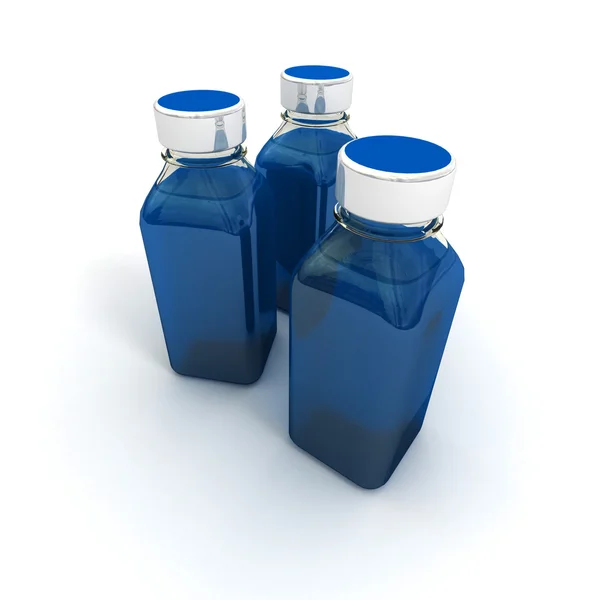 Trio niebieskie małe butelki — Zdjęcie stockowe