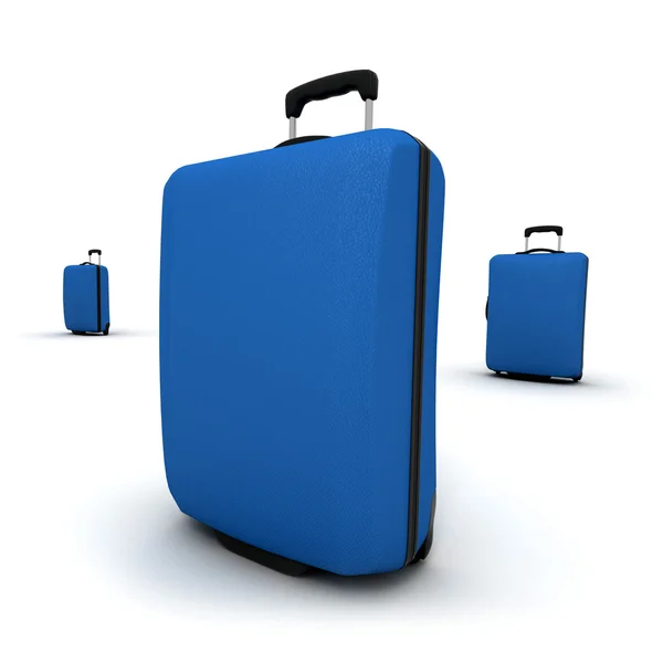 Трио синих чемоданов из тележки — стоковое фото