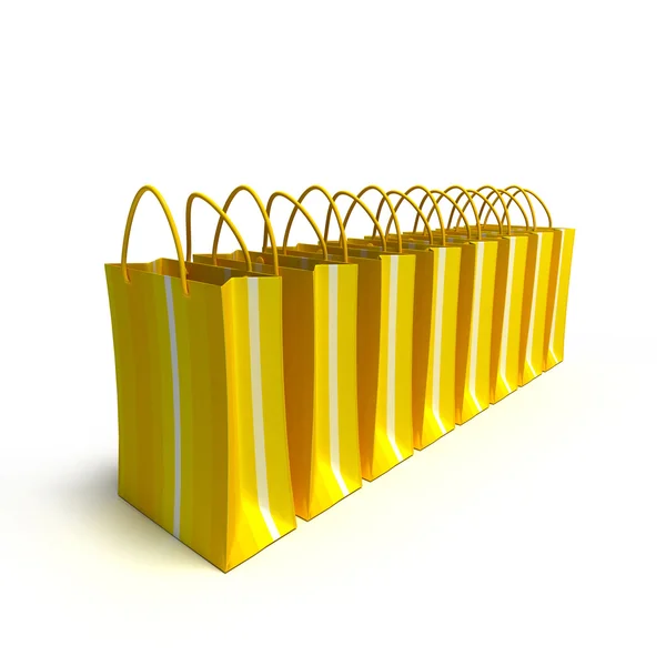 Reihe gelber Einkaufstüten — Stockfoto