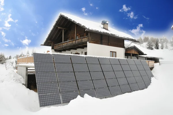 stock image Mountain cottage with solar panels