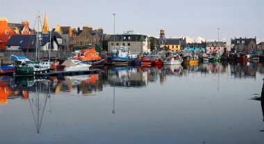 Stornoway harbour at dusk clipart