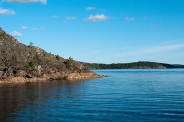 Northern Forest Islands In A Huge Lake clipart