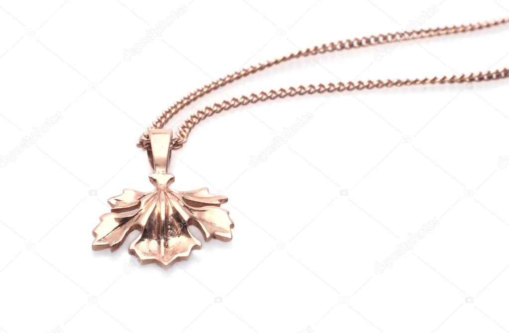 Golden necklace isolated on the white