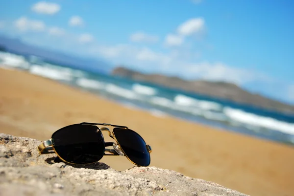 Trendy shades on beach — Stock Photo, Image