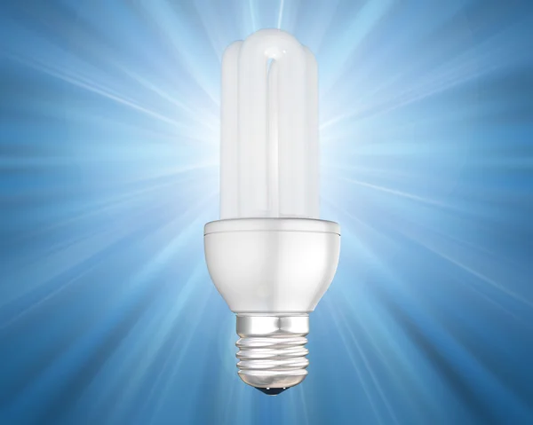 Освещенная энергосберегающая лампочка — стоковое фото