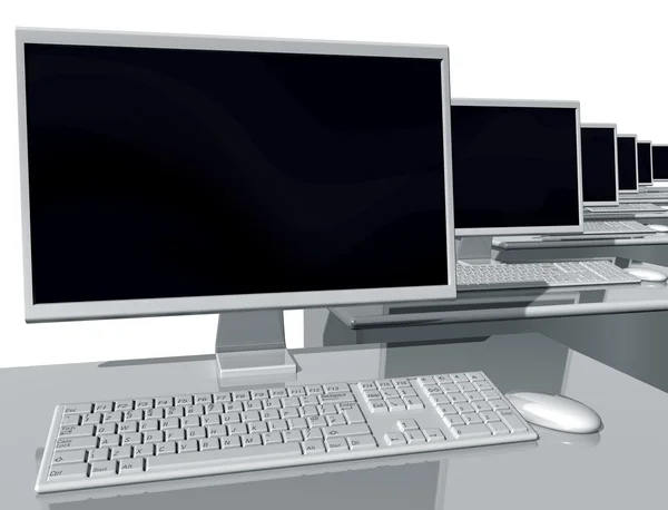 Computadores de mesa em um escritório — Fotografia de Stock