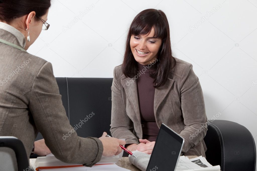 Two business women at the meeting