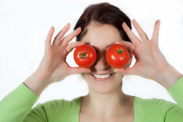 Kobieta z pomidorami — Zdjęcie stockowe