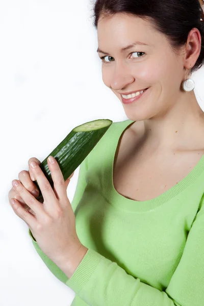 Woman with cucumber Royalty Free Stock Images
