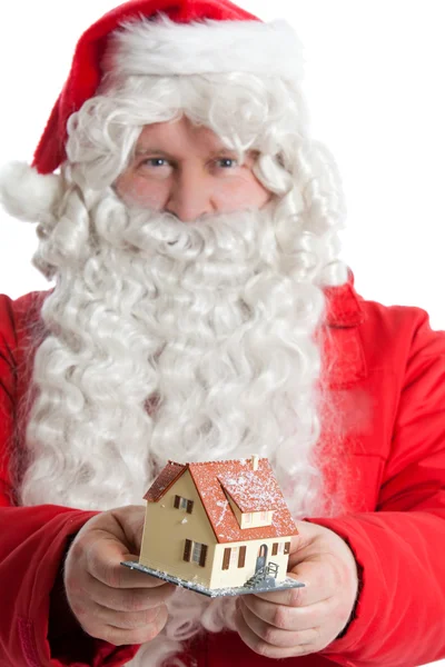圣诞老人控股房子 — 图库照片
