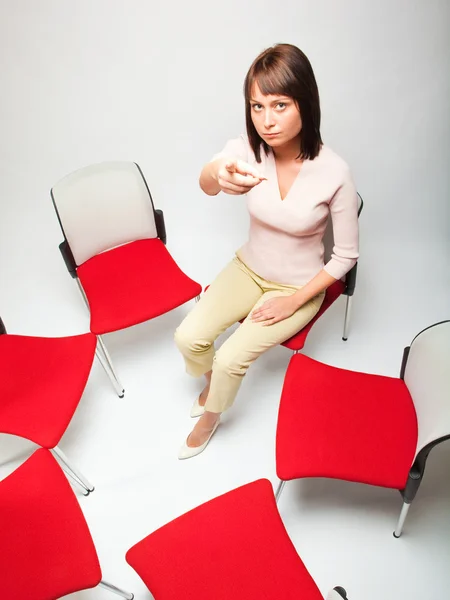 Business woman sitting in chair circle — Stock Photo, Image
