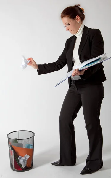 Business woman throwing papers — Stock Photo, Image
