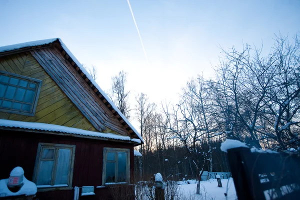 Sky and winter house — Stock Photo, Image