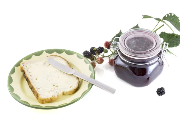 Bread with blackberry jam — Stock Photo, Image
