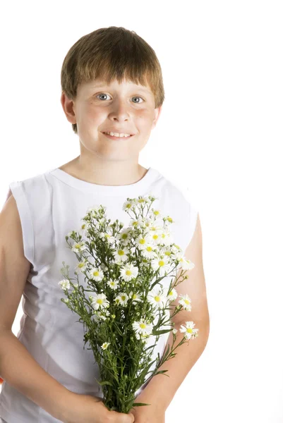 Chlapec s květinami — Stock fotografie