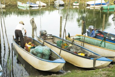 Fisherman in boat clipart