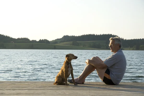 Man and his dog — Stock Photo, Image