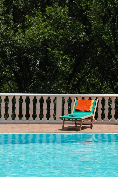 Sun bed at the swimming pool — Stock Photo, Image