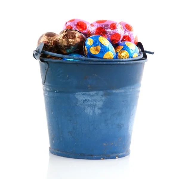 Old blue bucket with easter eggs — Stock Photo, Image